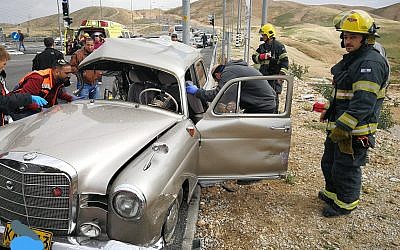 The scene of a car crash in the West Bank involving a classic 1960 Mercedes Benz in January 2019 (Courtesy of Judea and Samaria firefighting and rescue forces)