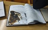 Burned prayer book found in Netanya synagogue after vandalism attack, January 27, 2019 (Police Spokesperson's Unit)