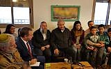 Prime Minister Benjamin Netanyahu (C) meeting families whose homes in the Netiv Ha'avot outpost were demolished last year, at the Elazar West Bank settlement, January 28, 2019. (Gush Etzion Regional Council)