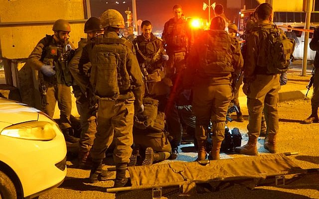 Soldiers at the scene of an attempted stabbing attack near the West Bank city of Nablus on January 21, 2019. (Israel Defense Forces) Soldiers at the scene of an attempted stabbing attack near the West Bank city of Nablus on January 21, 2019. (Israel Defense Forces)