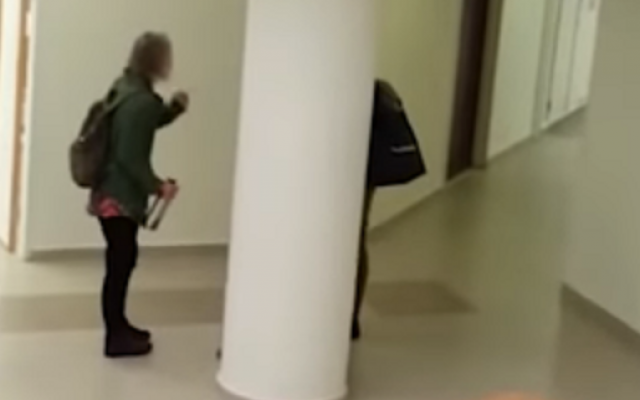Dr. Carola Hilfrich's argument with a student in army uniform at the Hebrew University in Jerusalem (video screenshot) Dr. Carola Hilfrich's argument with a student in army uniform at the Hebrew University in Jerusalem (video screenshot)
