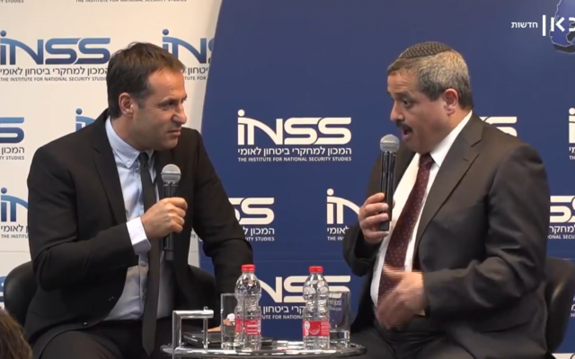 Former police chief Roni Alsheich (R) is interviewed by Udi Segal at the Institute for International Security Studies conference in Tel Aviv on January 27, 2019. (Sc
