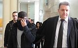 George Garib being led into Nazareth District Court January 29, 2019 for sentencing. Garib, 23, was handed a 5-year prison term for running over and killing police sergeant Natan Yossipov in 2016. (Screen Capture/ YouTube)