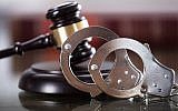 Illustrative: A gavel and handcuffs. (AndreyPopov/ Getty Images)