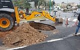 A sinkhole that formed in a street in the northern coastal town of Kiryat Yam, January 14, 2019, following rain. (Kiryat Yam municipality)