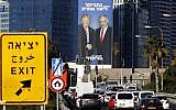 A picture taken on February 3, 2019 in Tel Aviv shows a giant election billboard of Prime Minister Benjamin Netanyahu and US President Donald Trump shaking hands. The writing on the billboard reads "Netanyahu, another league." (Jack Guez/AFP)