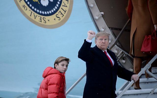 US President Donald Trump and son Barron Trump board Air Force One at Andrews Air Force Base in Maryland, en route to Palm Beach, Florida, on February 1, 2019. (Brendan Smialowski / AFP) US President Donald Trump and son Barron Trump board Air Force One at Andrews Air Force Base in Maryland, en route to Palm Beach, Florida, on February 1, 2019. (Brendan Smialowski / AFP)