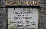 The marble plaque showing damage from recent vandalism on the front of the tomb of German revolutionary philosopher Karl Marx, a Grade I-listed monument, is seen in Highgate Cemetery in north London on February 5, 2019. (Tolga Akmen/AFP)