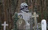 The tomb of German revolutionary philosopher Karl Marx, a Grade I-listed monument, is seen in Highgate Cemetery in north London on February 5, 2019. (Tolga Akmen/AFP)
