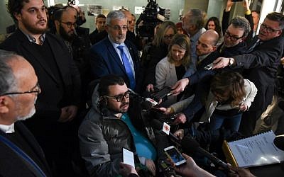 Aymen Derbali, a victim in the Quebec mosque attack, talks to the press in the Quebec City Courthouse following the sentencing of perpetrator Alexandre Bissonnette, on February 8, 2019. (Alice Chiche / AFP)