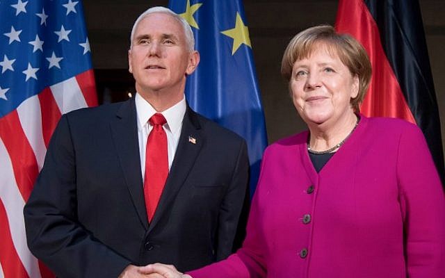 German Chancellor Angela Merkel (R) and US Vice President Mike Pence shake hands at a photo call during the 55th Munich Security Conference on February 16, 2019. (Sven Hoppe / dpa / AFP) German Chancellor Angela Merkel (R) and US Vice President Mike Pence shake hands at a photo call during the 55th Munich Security Conference on February 16, 2019. (Sven Hoppe / dpa / AFP)