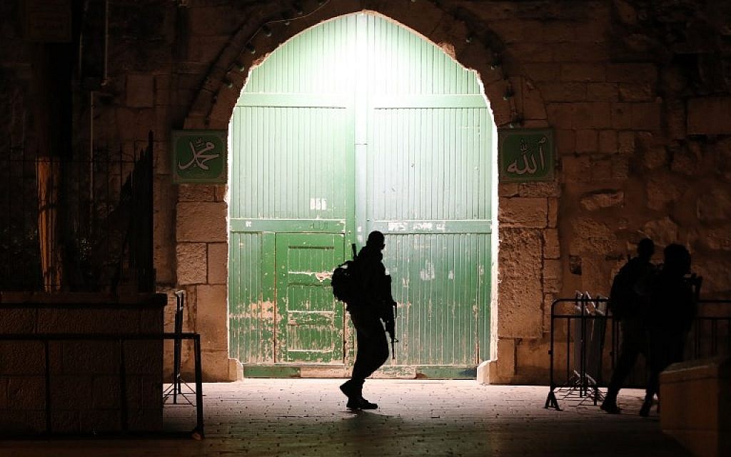 An Israeli border police officer patrols an entrance to the Temple Mount in Jerusalem's Old City, on February 19, 2019. (Ahmad Gharabli/AFP) An Israeli border police officer patrols an entrance to the Temple Mount in Jerusalem's Old City, on February 19, 2019. (Ahmad Gharabli/AFP)