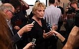Pro-Europe British politician, Conservative party MP Anna Soubry, center, speaks to members of the media at a People's Vote campaign press conference in London on December 11, 2018. (Oli SCARFF/AFP)