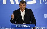 Former IDF chief of staff Gabi Ashkenazi speaks at the official unveiling of the new Blue and White party in Tel Aviv on February 21, 2019. (Jack Guez/AFP)