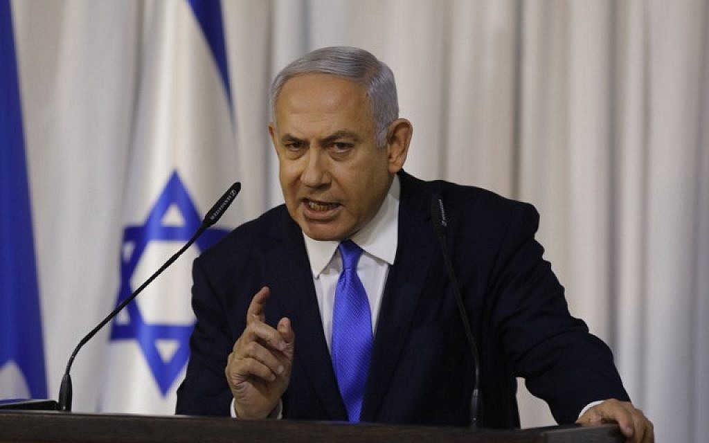 Prime Minister Benjamin Netanyahu gives a televised statement after a meeting of his ruling Likud party in Ramat Gan on February 21, 2019. (Menahem Kahana/AFP) Prime Minister Benjamin Netanyahu gives a televised statement after a meeting of his ruling Likud party in Ramat Gan on February 21, 2019. (Menahem Kahana/AFP)