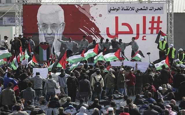 Palestinian demonstrators attend a protest demanding Palestinian president Mahmoud Abbas to step down, Gaza City, February 24, 2019. (MAHMUD HAMS/AFP) Palestinian demonstrators attend a protest demanding Palestinian president Mahmoud Abbas to step down, Gaza City, February 24, 2019. (MAHMUD HAMS/AFP)
