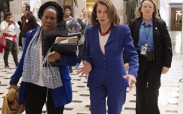 US Speaker of the House Nancy Pelosi (C R)) and congresswoman Sheila Jackson Lee (C L) walk to the House Chambers, to vote on blocking the national emergency over border situation on Capitol Hill in Washington, DC, on February 26, 2019. (Photo by Jim WATSON / AFP) US Speaker of the House Nancy Pelosi (C R)) and congresswoman Sheila Jackson Lee (C L) walk to the House Chambers, to vote on blocking the national emergency over border situation on Capitol Hill in Washington, DC, on February 26, 2019. (Photo by Jim WATSON / AFP)