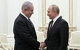 Russian President Vladimir Putin (R) shakes hands with Prime Minister Benjamin Netanyahu during a meeting at the Kremlin in Moscow on February 27, 2019. (MAXIM SHEMETOV / POOL / AFP)