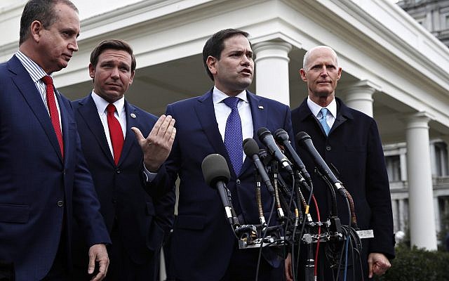 In this January 22, 2019, photo, Representative Mario Diaz-Balart, left, Florida Governor Ron DeSantis, Senator Marco Rubio and Senator Rick Scott, speak to the media after their meeting with US President Donald Trump about Venezuela, at the White House in Washington. (AP Photo/Jacquelyn Martin) In this January 22, 2019, photo, Representative Mario Diaz-Balart, left, Florida Governor Ron DeSantis, Senator Marco Rubio and Senator Rick Scott, speak to the media after their meeting with US President Donald Trump about Venezuela, at the White House in Washington. (AP Photo/Jacquelyn Martin)