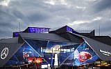 Mercedes-Benz Stadium is lit up ahead of the NFL Super Bowl 53 football game between the Los Angeles Rams and the New England Patriots in Atlanta, on February 2, 2019. (AP/David Goldman)