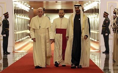 Pope Francis is welcomed by Abu Dhabi's Crown Prince Sheikh Mohammed bin Zayed Al Nahyan, upon his arrival at the Abu Dhabi airport, United Arab Emirates, on February 3, 2019. (AP Photo/Andrew Medichini, Pool)
