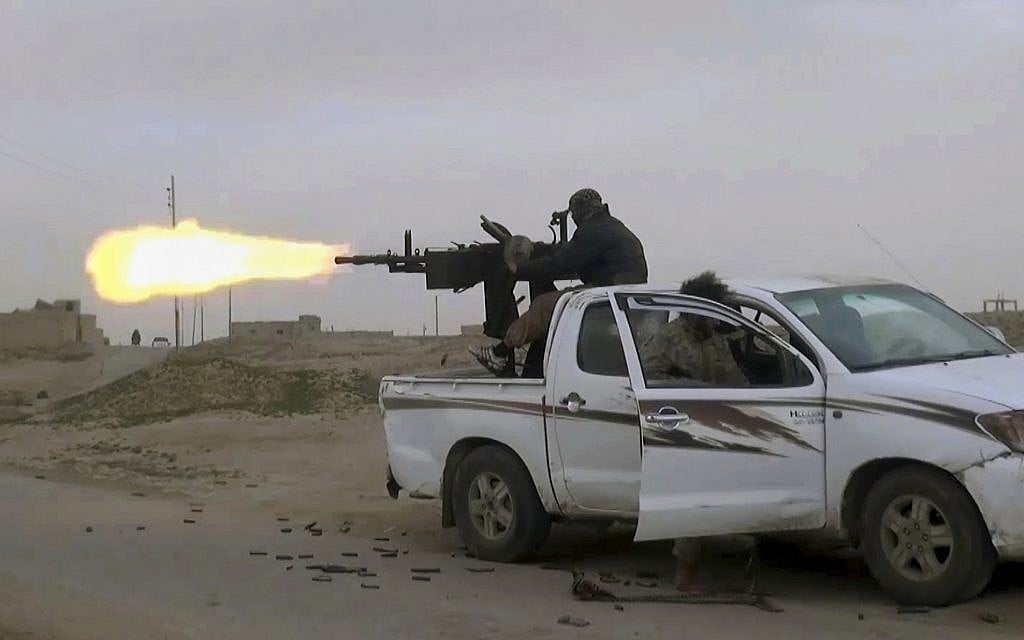 Qatar and FBI find remains of 30 people believed killed by Islamic State in Syria