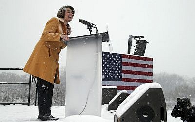 Democratic Sen. Amy Klobuchar addresses a snowy rally where she announced she is entering the race for president Sunday, Feb. 10, 2019, at Boom Island Park in Minneapolis. (AP Photo/Jim Mone)