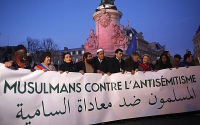 French Muslim people gather at the Republique square to protest against anti-Semitism in Paris, France, Feb. 19, 2019.  (AP Photo/Thibault Camus)
