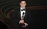 Rami Malek accepts the award for best performance by an actor in a leading role for "Bohemian Rhapsody" at the Oscars on February 24, 2019, at the Dolby Theatre in Los Angeles. (Photo by Chris Pizzello/Invision/AP)