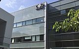 The logo of the Israeli company NSO Group is displayed on a building where it had offices in Herzliya until 2016. (AP Photo/Daniella Cheslow)