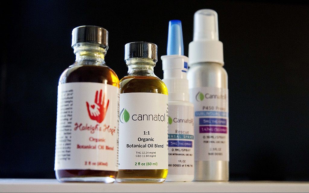 Illustrative: In this photo from April 17, 2017, various cannabis oil products are displayed in the office of Georgia State Rep. Allen Peake, in Macon, Georgia.  (AP Photo/David Goldman)