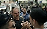 Eduardo Bolsonaro greets students as he leaves the Santa Casa hospital where his father was hospitalized in Juiz de Fora, Brazil, Sept. 6, 2018 (AP Photo/Leo Correa)