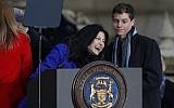 Democratic Attorney General Dana Nessel, laughs before addressing the crowd outside the state Capitol building, Tuesday, January 1, 2019 in Lansing, Michigan. (AP Photo/Carlos Osorio)