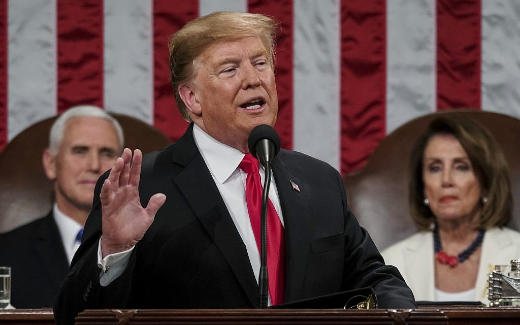US President Donald Trump gives his State of the Union address to a joint session of Congress, February 5, 2019, at the Capitol in Washington, as Vice President Mike Pence, left, and House Speaker Nancy Pelosi look on. (Doug Mills/The New York Times via AP, Pool) US President Donald Trump gives his State of the Union address to a joint session of Congress, February 5, 2019, at the Capitol in Washington, as Vice President Mike Pence, left, and House Speaker Nancy Pelosi look on. (Doug Mills/The New York Times via AP, Pool)