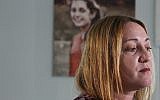 Lori Alhadeff, mother of 14-year-old Alyssa Alhadeff who was one of 17 people killed at Marjory Stoneman Douglas High School, speaks during an interview with a portrait of her daughter in the background, on January 30, 2019, in Parkland, Florida.(AP Photo/Brynn Anderson)