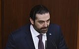 Lebanese Prime Minister Saad Hariri reads the government policy statement before a debate for vote of confidence, in the Lebanese parliament, in Beirut, February 12, 2019. (AP Photo/ Ali Fawaz, Lebanese Parliament media office)