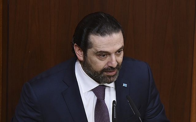 Lebanese Prime Minister Saad Hariri reads the government policy statement before a debate for vote of confidence, in the Lebanese parliament, in Beirut, February 12, 2019. (AP Photo/ Ali Fawaz, Lebanese Parliament media office)