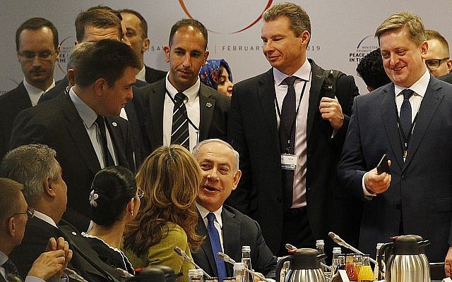 Prime Minister Benjamin Netanyahu, center, arrives for a session at the conference on Peace and Security in the Middle East in Warsaw, Poland, February 14, 2019. (AP/Czarek Sokolowski) Prime Minister Benjamin Netanyahu, center, arrives for a session at the conference on Peace and Security in the Middle East in Warsaw, Poland, February 14, 2019. (AP/Czarek Sokolowski)