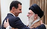 In this photo released by the Syrian official news agency SANA, Syrian President Bashar Assad, left, shakes hands with Iranian Supreme Leader Ayatollah Ali Khamenei, before their meeting in Tehran, Iran, on February 25, 2019.  (SANA via AP)