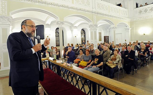 Chief Rabbi of Poland Michael Schudrich, left, who co-wrote the letter of complaint against Israel Katz, seen speaking to visitors in a synagogue in Warsaw in 2015. (AP Photo/Alik Keplicz/File) Chief Rabbi of Poland Michael Schudrich, left, who co-wrote the letter of complaint against Israel Katz, seen speaking to visitors in a synagogue in Warsaw in 2015. (AP Photo/Alik Keplicz/File)