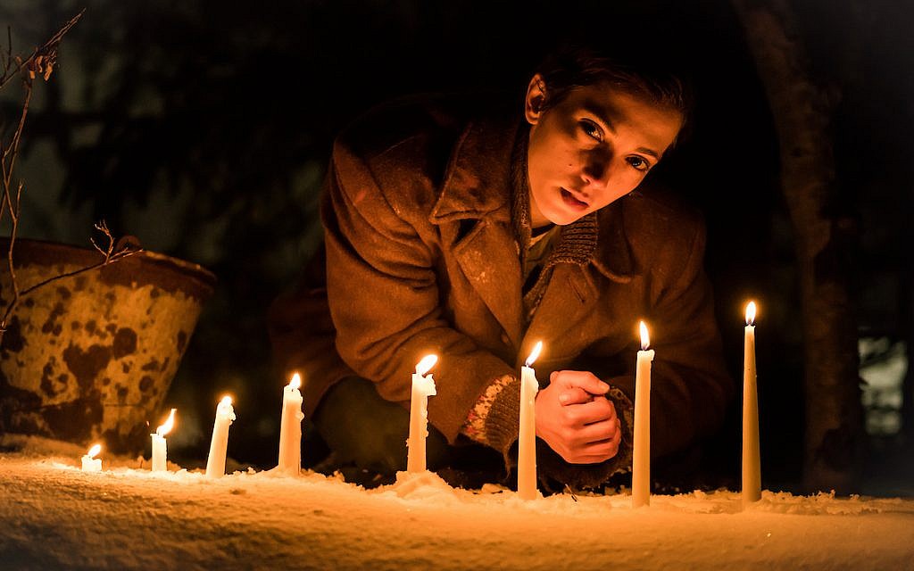 in the new Holocaust dramatic film 'The Bird Catcher,' Esther (Sarah-Sofie Boussnina), a Norwegian Jewish teenage girl, cuts off her hair and poses as a non-Jewish boy named Ola to escape persecution by the Nazis and collaborators. (Courtesy)