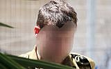 An elite Duvdevan unit combat soldier convicted of accidentally killing First Sergeant Shachar Strug appears at the Jaffa military court, on April 4, 2018. (FLASH90)