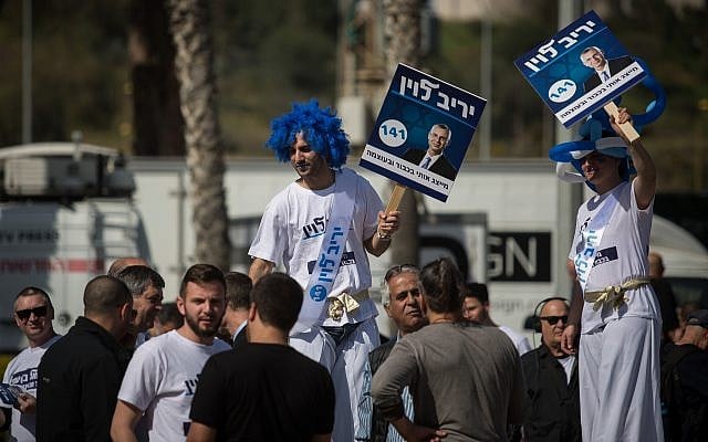 Likud supporters campaign for party members and candidates at the Tel Aviv Likud polling station on February 5, 2019. (Hadas Parush/Flash90) Likud supporters campaign for party members and candidates at the Tel Aviv Likud polling station on February 5, 2019. (Hadas Parush/Flash90)
