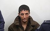 Arafat Irfaiya, charged with the murder of 19-year-old Ori Ansbacher, at the Jerusalem Magistrate's court on February 11, 2019. (Yonatan Sindel/Flash90)