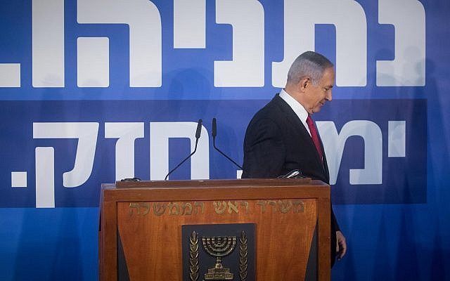 Prime Minister Benjamin Netanyahu departs after delivering a statement to the media in Jerusalem, hours after the attorney general announced his intention to indict him on corruption charges, February 28, 2019. (Yonatan Sindel/Flash90) Prime Minister Benjamin Netanyahu departs after delivering a statement to the media in Jerusalem, hours after the attorney general announced his intention to indict him on corruption charges, February 28, 2019. (Yonatan Sindel/Flash90)