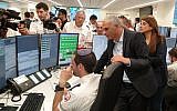 Finance Minister Moshe Kahlon, right,  at the dedication ceremony for a new Magen David Adom emergency services dispatch center which is protected against missile, chemical, and biological attacks, February 25, 2019. (MDA spokesperson)