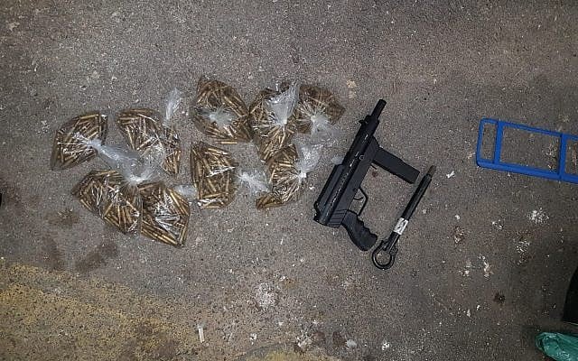 A Carlo-style submachine gun and bullets, which were found by Israeli security officials at the Te'enim checkpoint between Israel and the northern West Bank on February 24, 2019. (Defense Ministry) A Carlo-style submachine gun and bullets, which were found by Israeli security officials at the Te'enim checkpoint between Israel and the northern West Bank on February 24, 2019. (Defense Ministry)