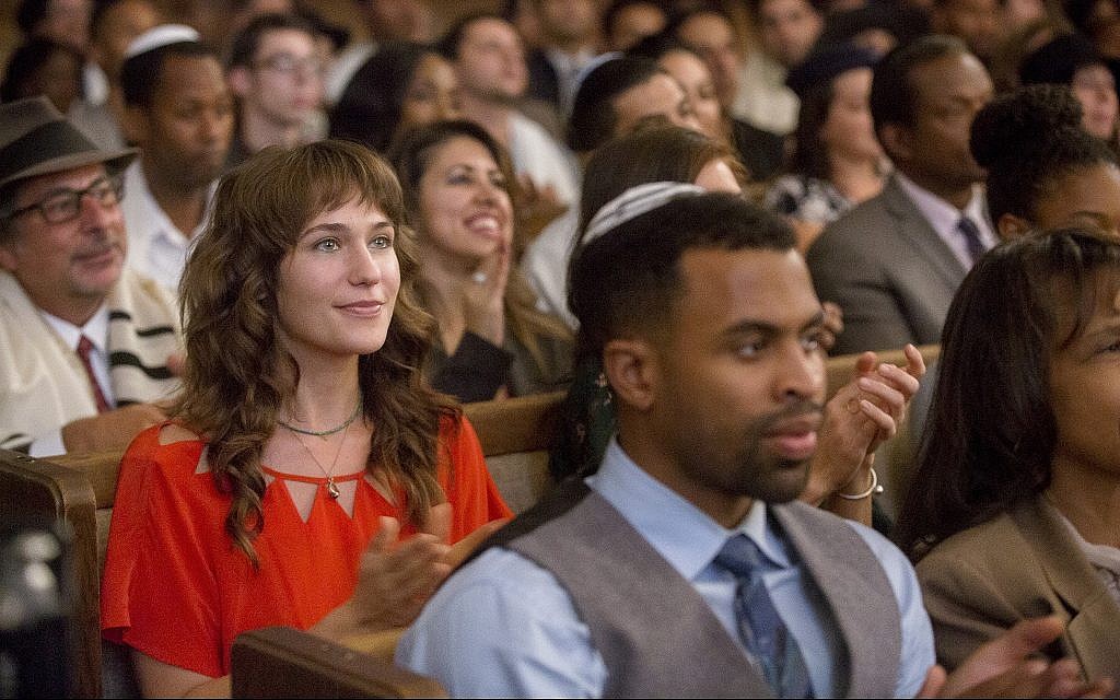 Tara, played by Lola Kirke, in synagogue in the new film 'Untogether.' (Courtesy Freestyle Digital Releasing)