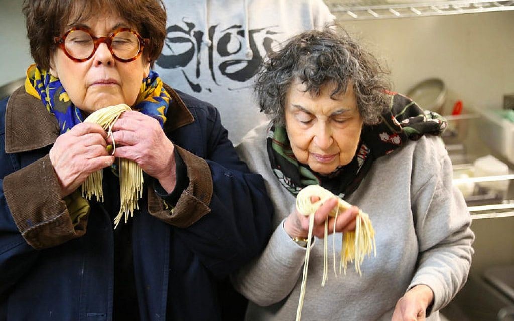 Marilynn (left) and Sheila Brass learn how to make ramen noodles at Shojo restaurant in Boston's Chinatown. (Bruce Seidel)