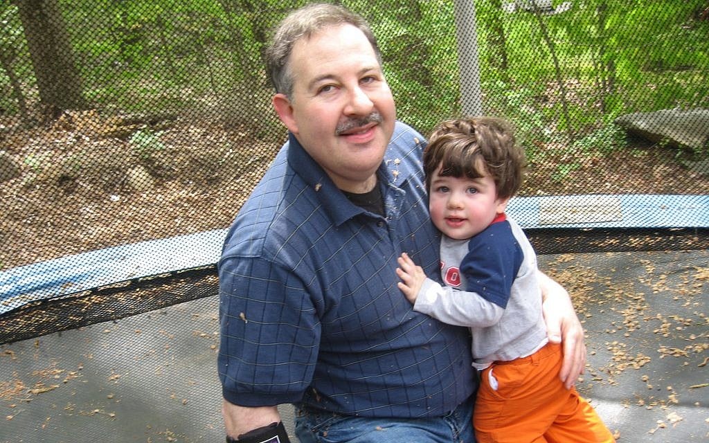 Lenny Pozner with his son Noah. (Courtesy)